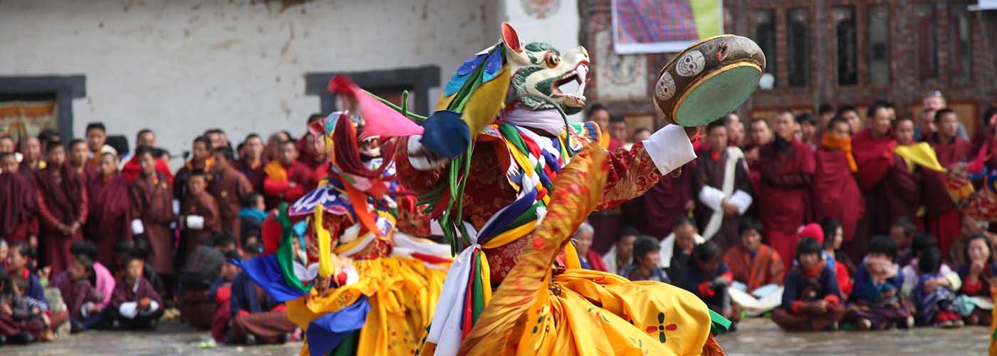 Traditional mask dancer performing at Black-Necked Crane Festival in Gangtey Monastery